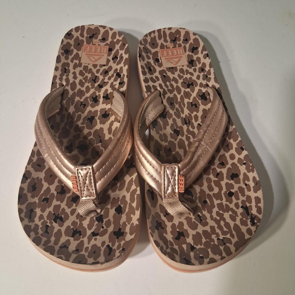 Girls Reef leopard print flip flops brown and pink